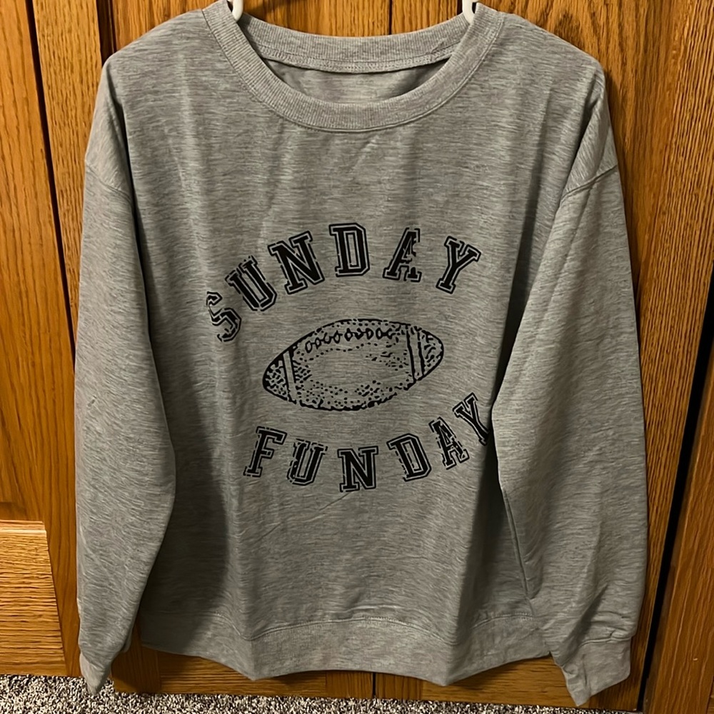 Brand New! Never Worn Dark Grey Sunday Funday Sweater. Size Medium.